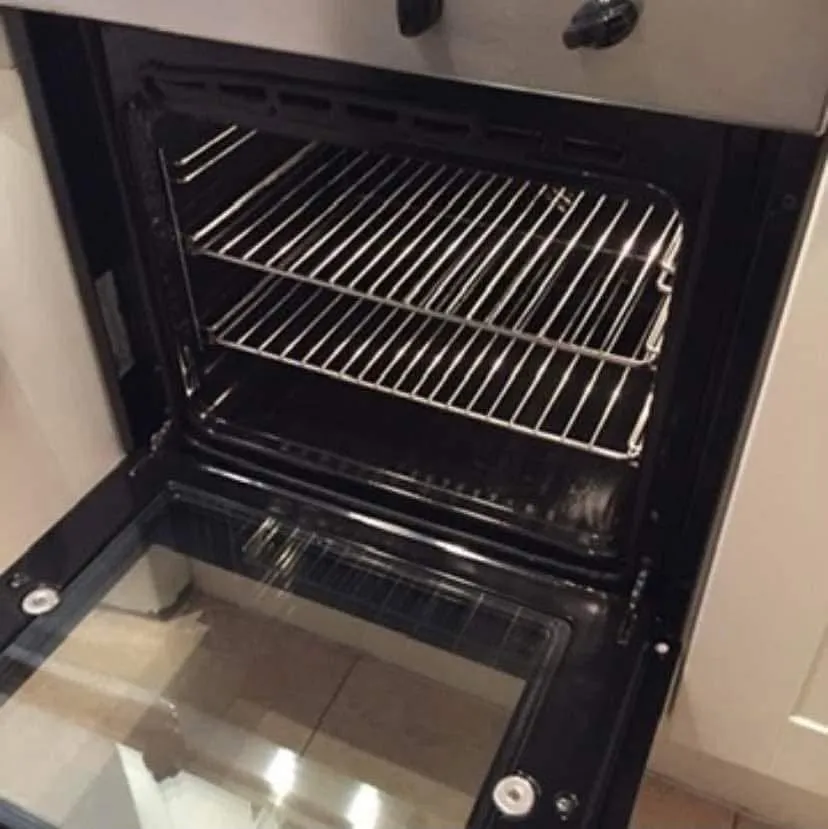 Oven interior after cleaning with shining racks